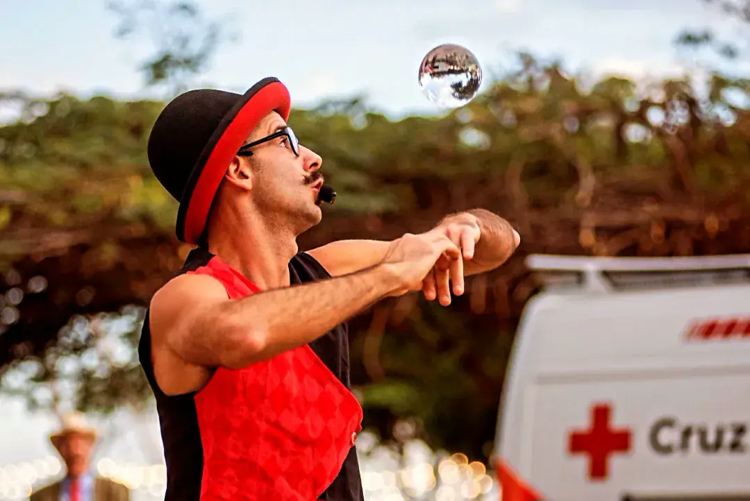 Tadeo performing with a crystal ball