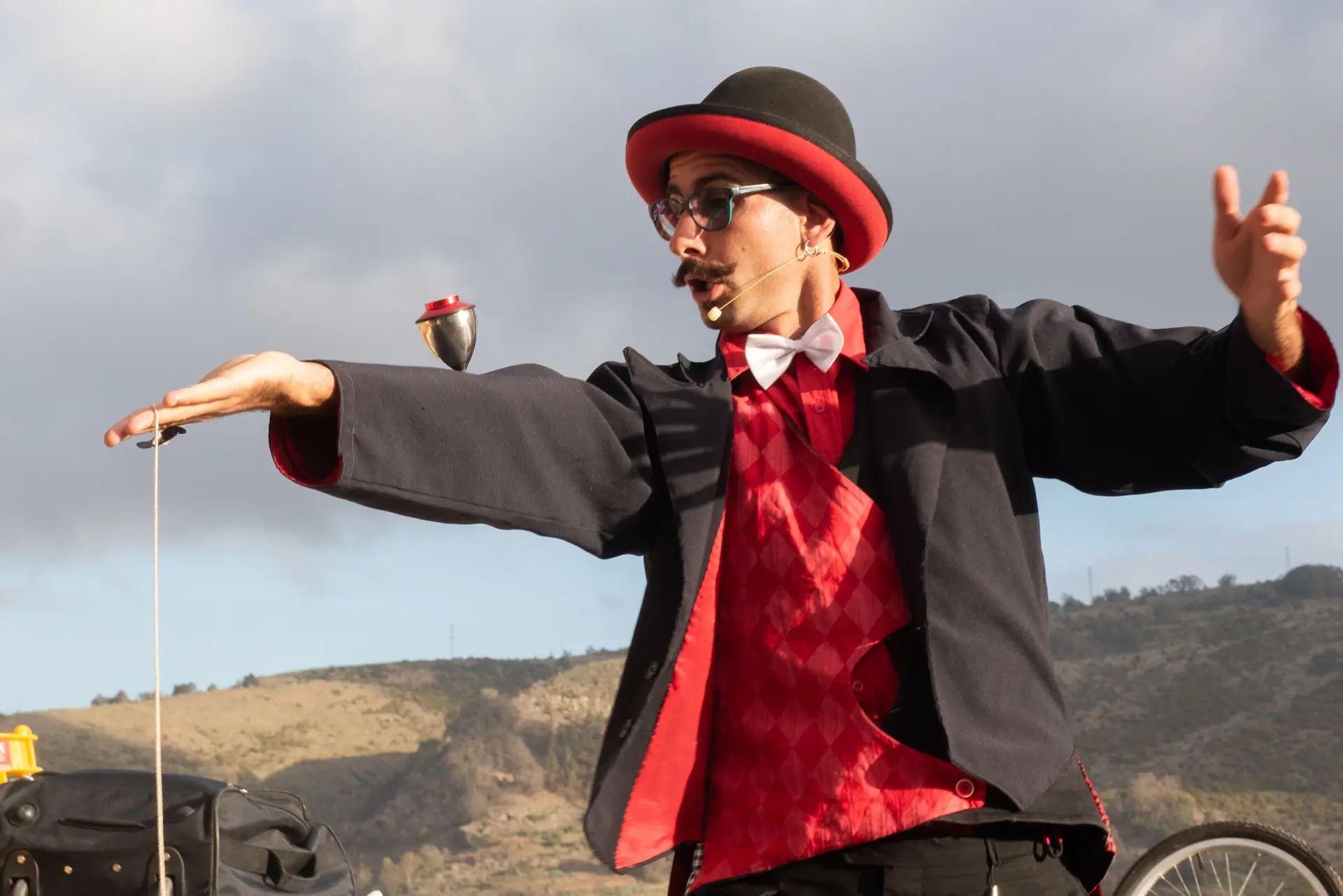 Tadeo performing with a spinning top